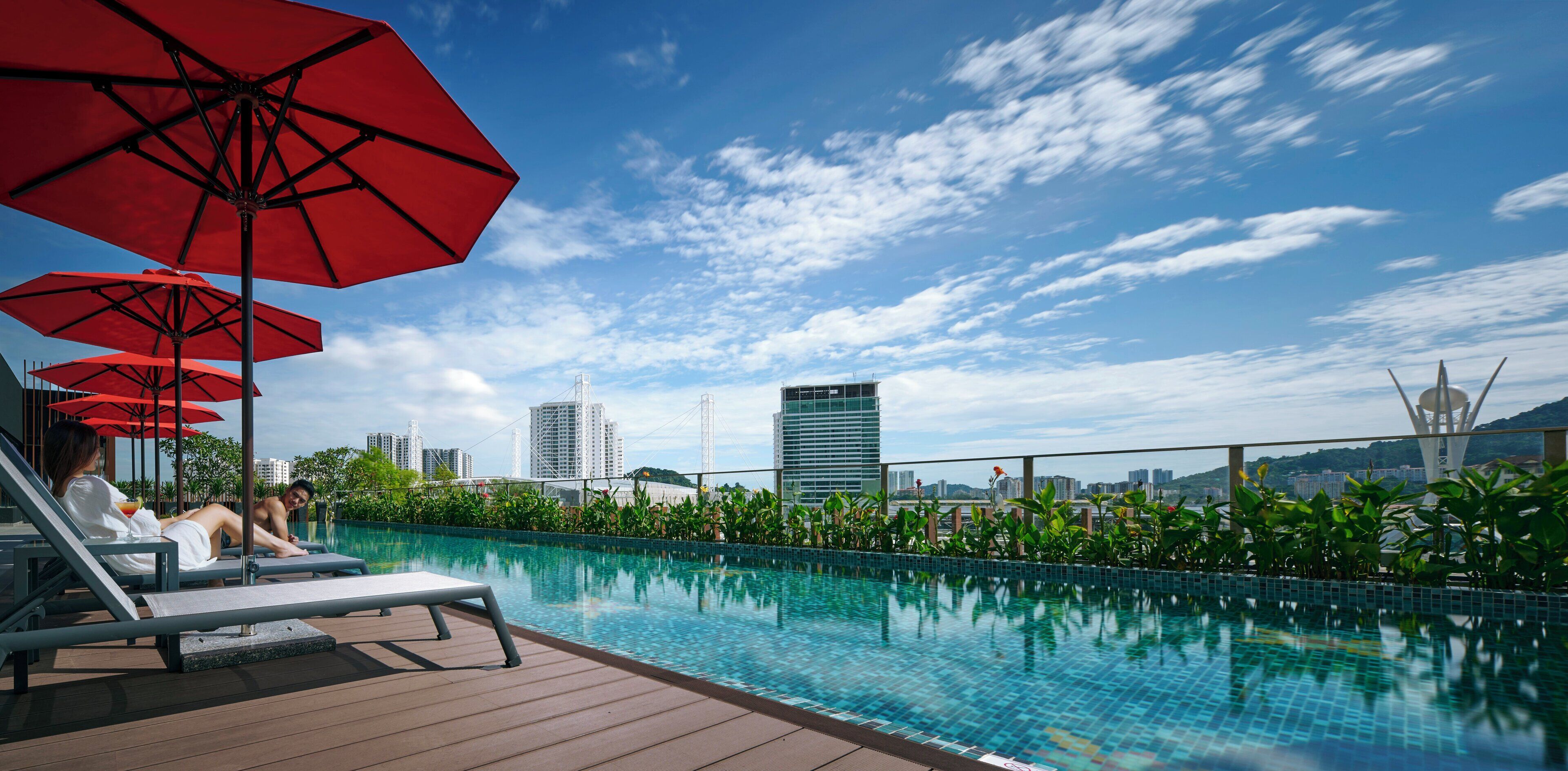 2 outdoor pools, open 7:00 AM to 7:00 PM, pool umbrellas, pool loungers