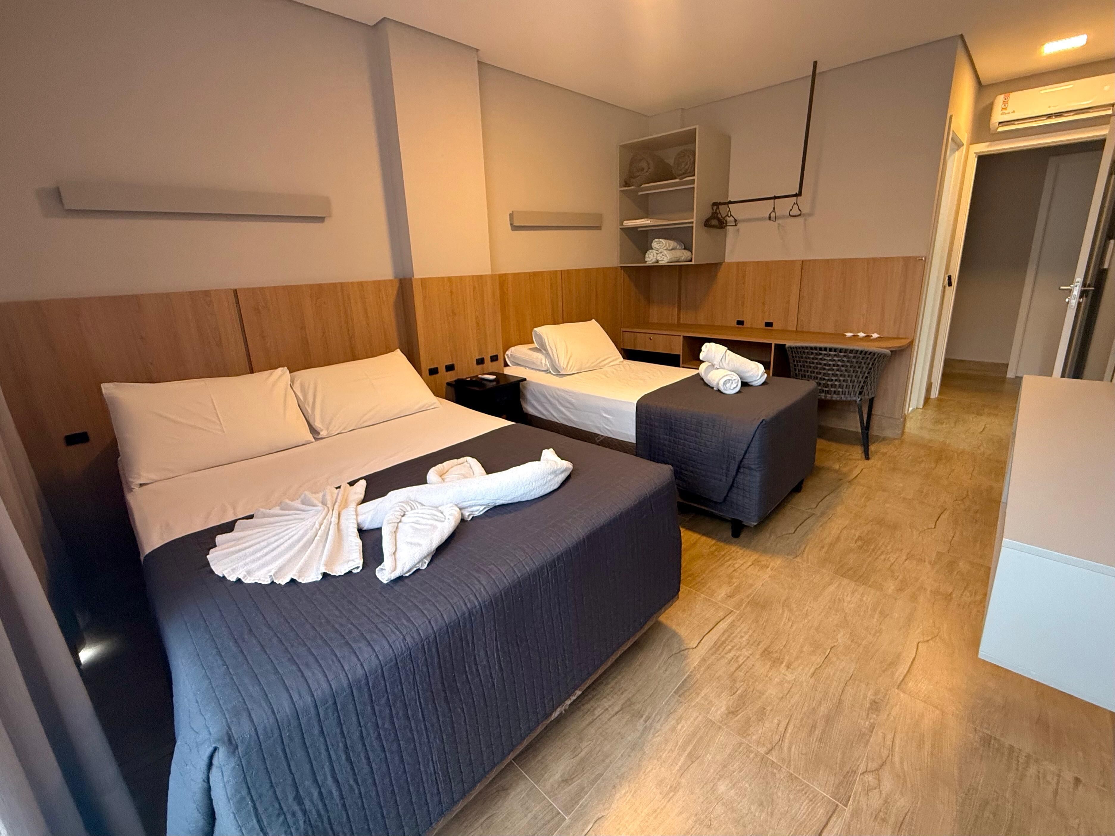 Comfort Triple Room | Minibar, individually decorated, individually furnished, desk