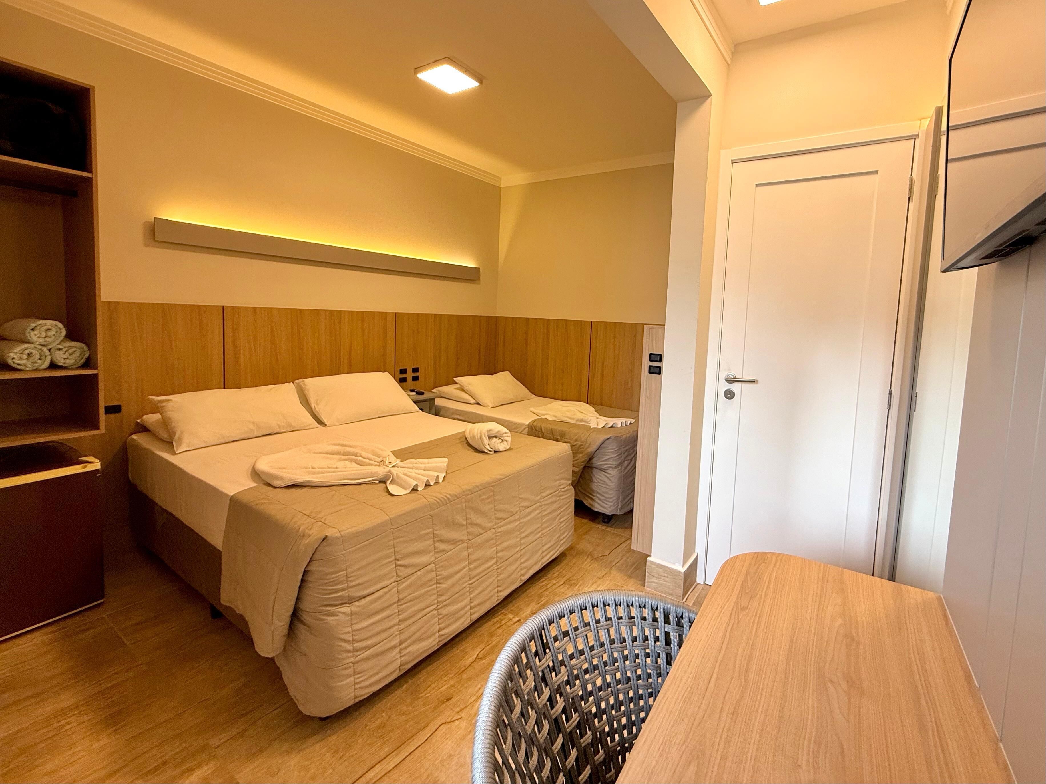 Quarto triplo econômico | Frigobar, individualmente decorados, individualmente mobiliados