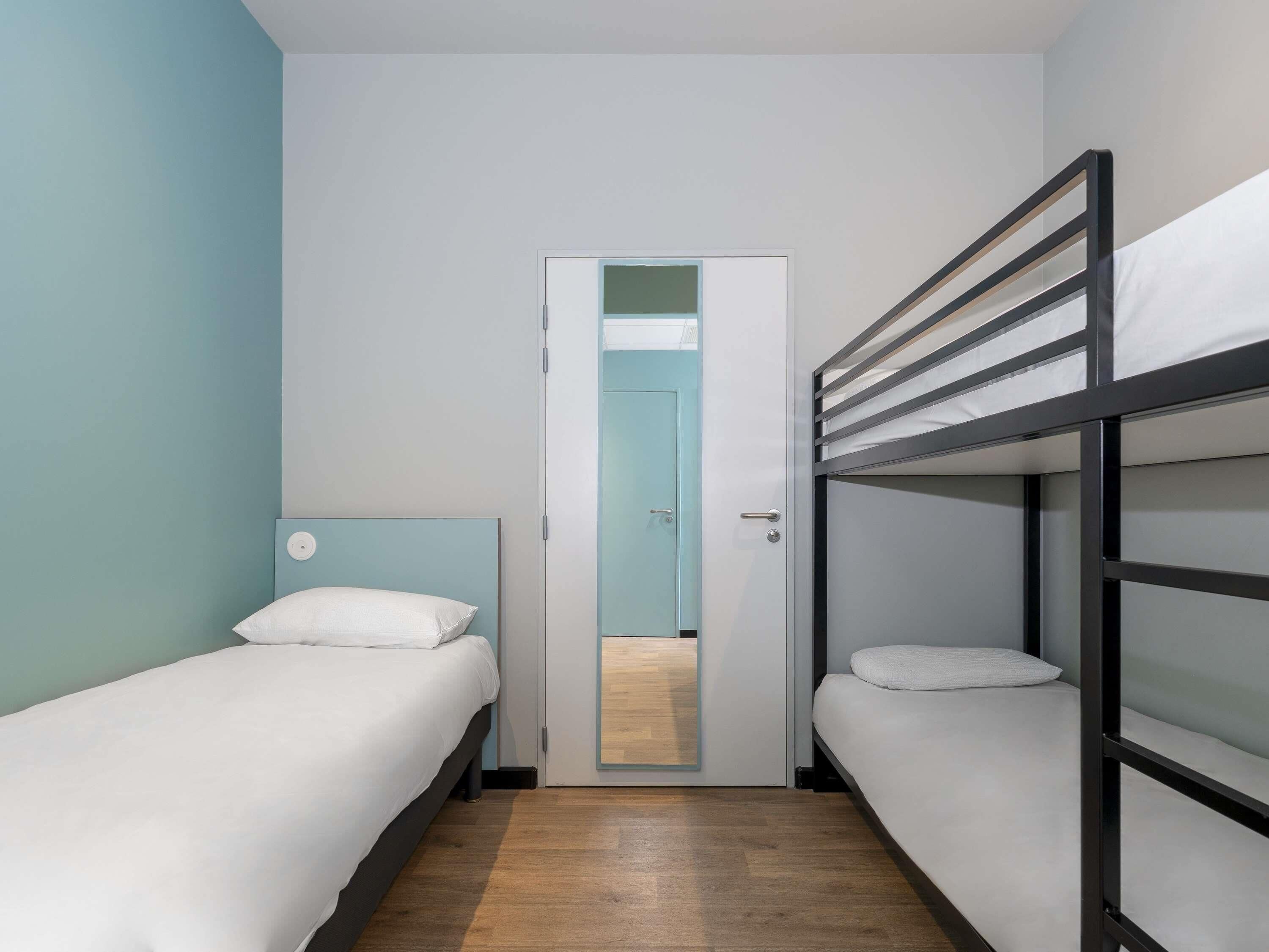 Chambre (5 people) | Rideaux occultants, chambres insonorisées, fer et planche à repasser