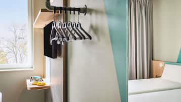 Blackout drapes, soundproofing, iron/ironing board