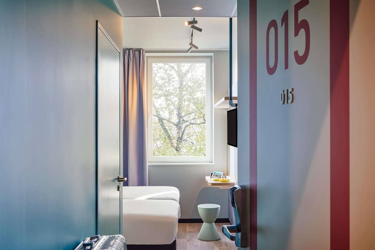Standard Room, 2 Single Beds | Blackout curtains, soundproofing, iron/ironing board