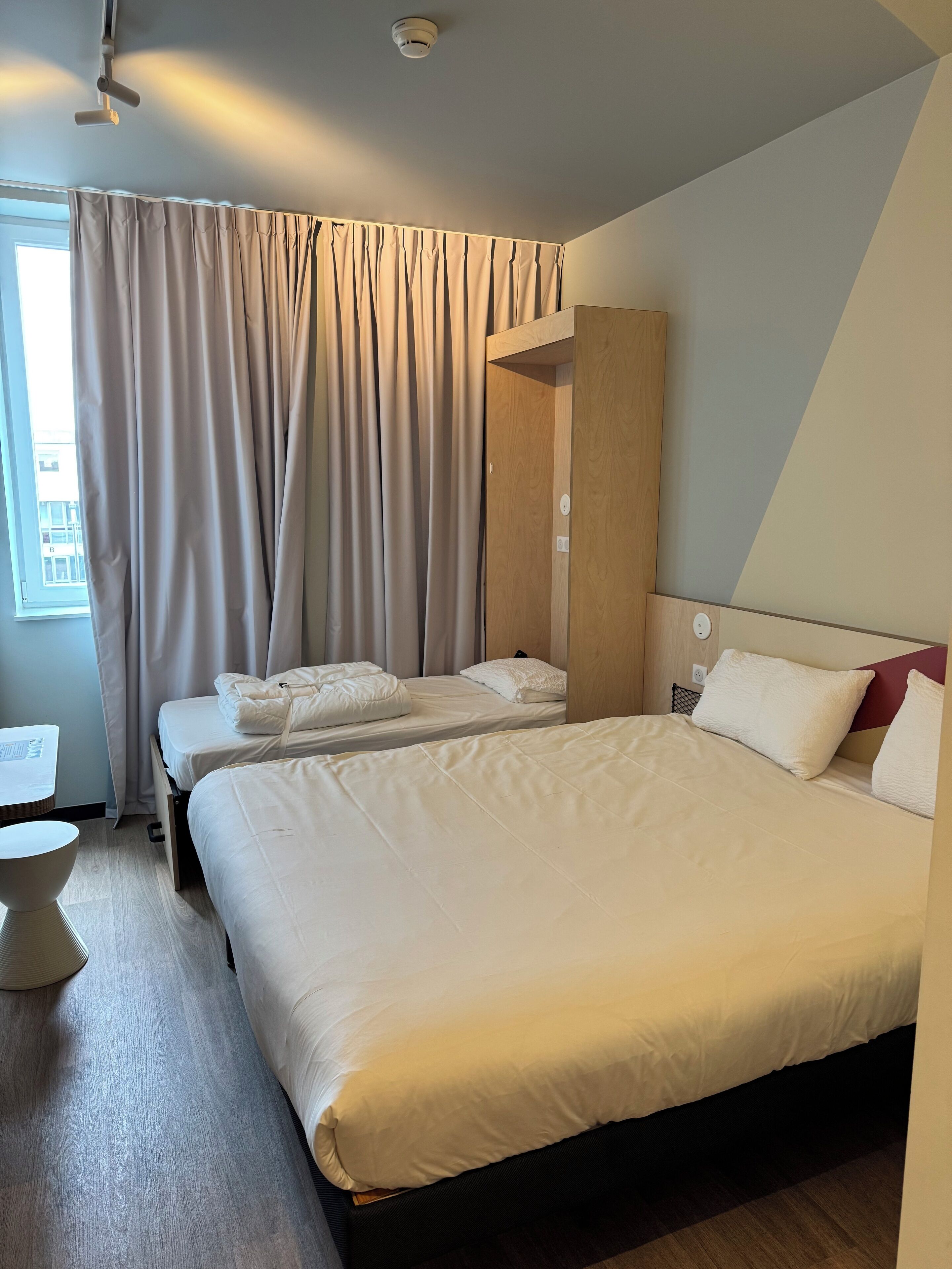 triple room, multiple beds | blackout curtains, soundproofing, iron/ironing board