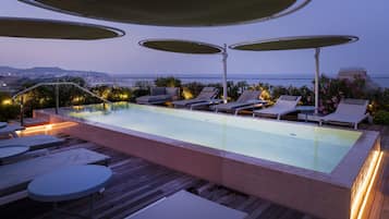 Indoor pool, outdoor pool, pool umbrellas
