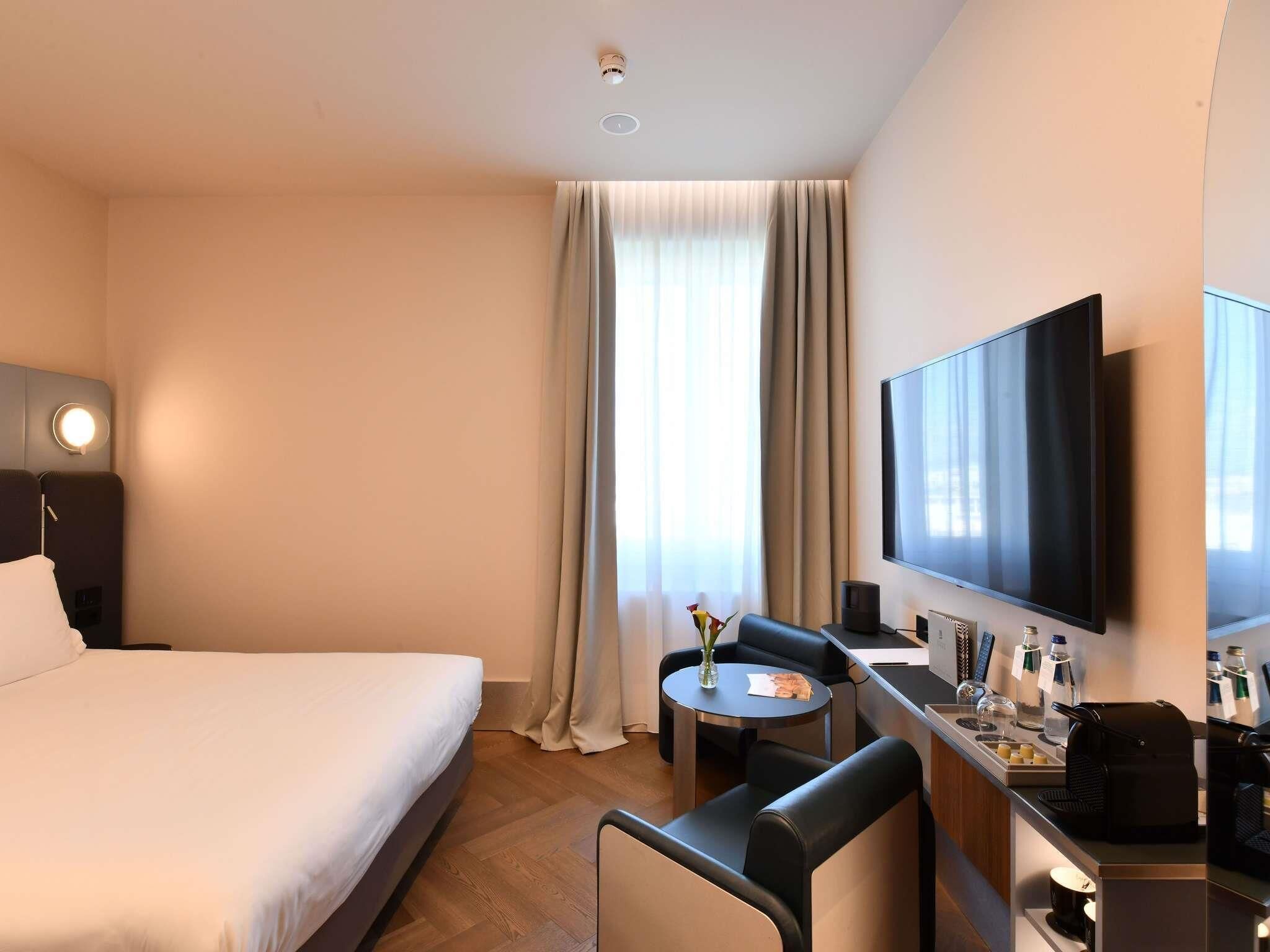 Habitación superior, 1 cama King size | Ropa de cama de alta calidad, edredón y camas con efecto memoria 