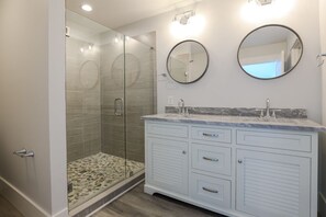 Combined shower/tub, hair dryer, towels, soap