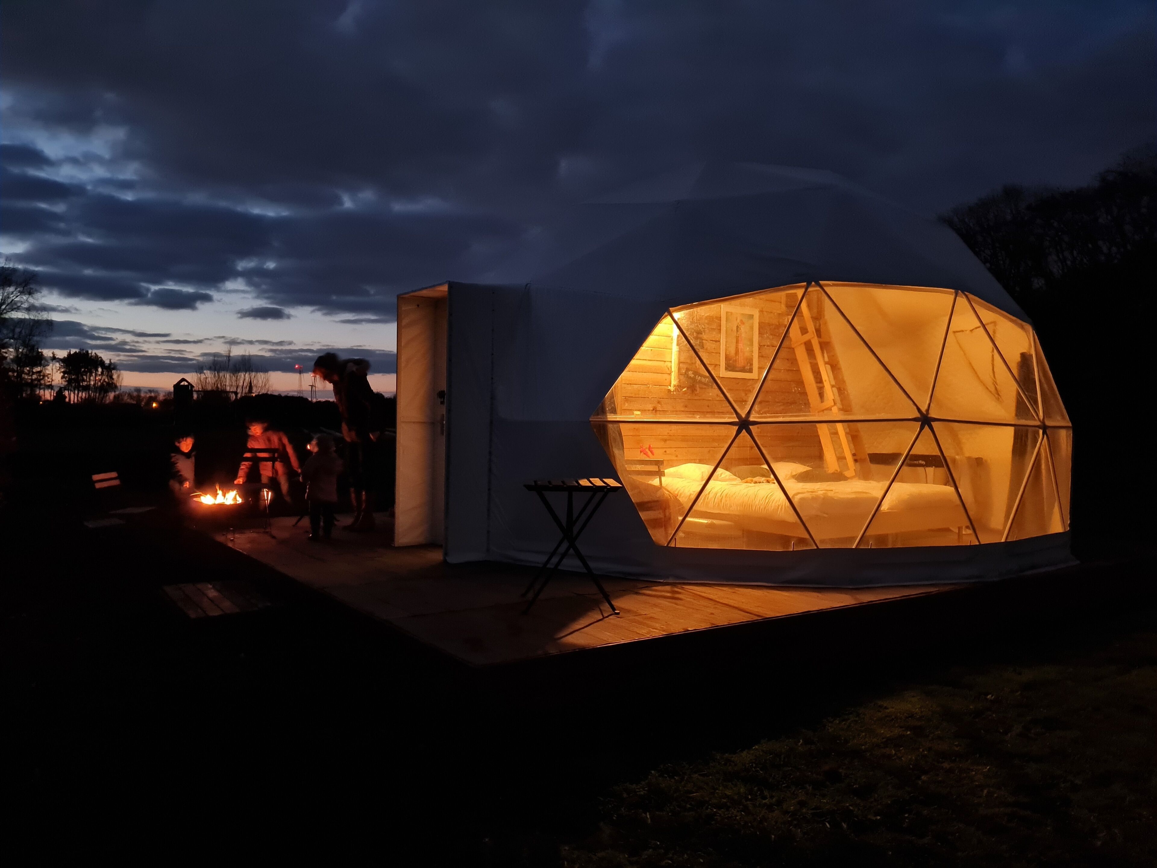 Deluxe Tent | Premium bedding, down comforters, individually decorated