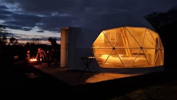 Deluxe Tent | Premium bedding, down comforters, individually decorated