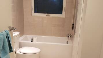 Combined shower/tub, jetted tub