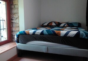 2 chambres, chambres insonorisées, fer et planche à repasser