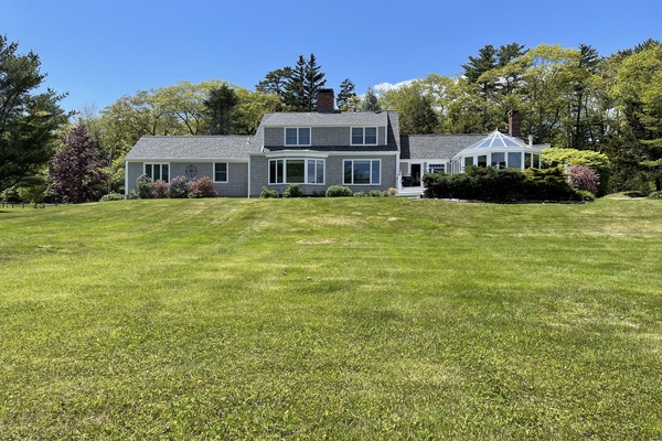 Photo of the main house with sprawling lawn