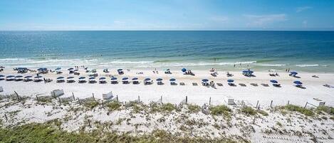 On the beach, sun-loungers