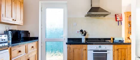 Cottage | Cucina privata | Frigorifero, lavastoviglie, pentole/stoviglie/utensili