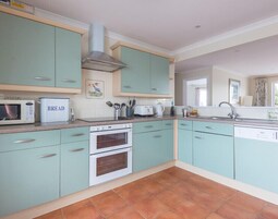 Cottage | Private kitchen | Fridge, dishwasher, cookware/dishes/utensils