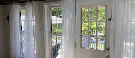 Front room and second bedroom with skylight.