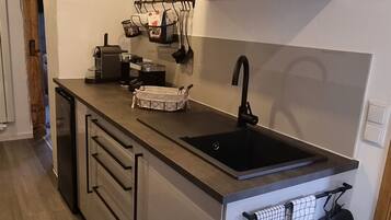 Fridge, coffee/tea maker, electric kettle, toaster