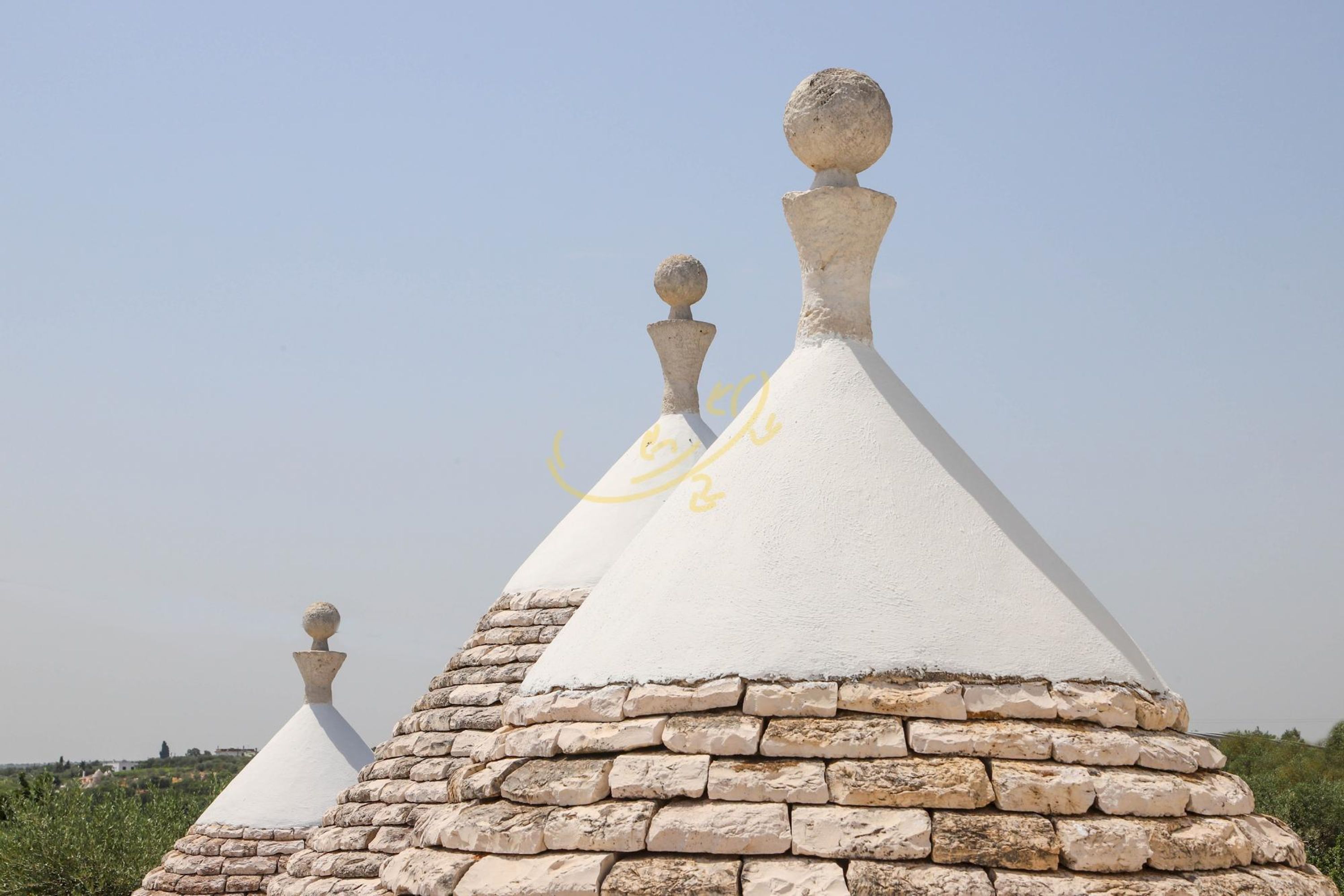 A building with a white, stone-topped structure.
