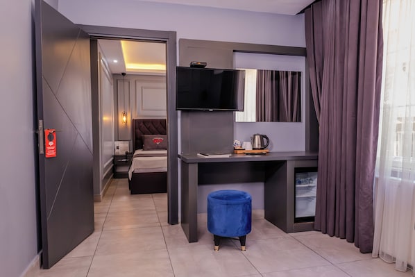 Chambre Deluxe | Minibar, coffres-forts dans les chambres, Wi-Fi gratuit, draps fournis