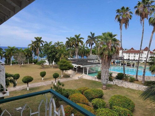 Romantic condo with private beach and pool