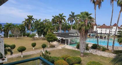 Romantic condo with private beach and pool