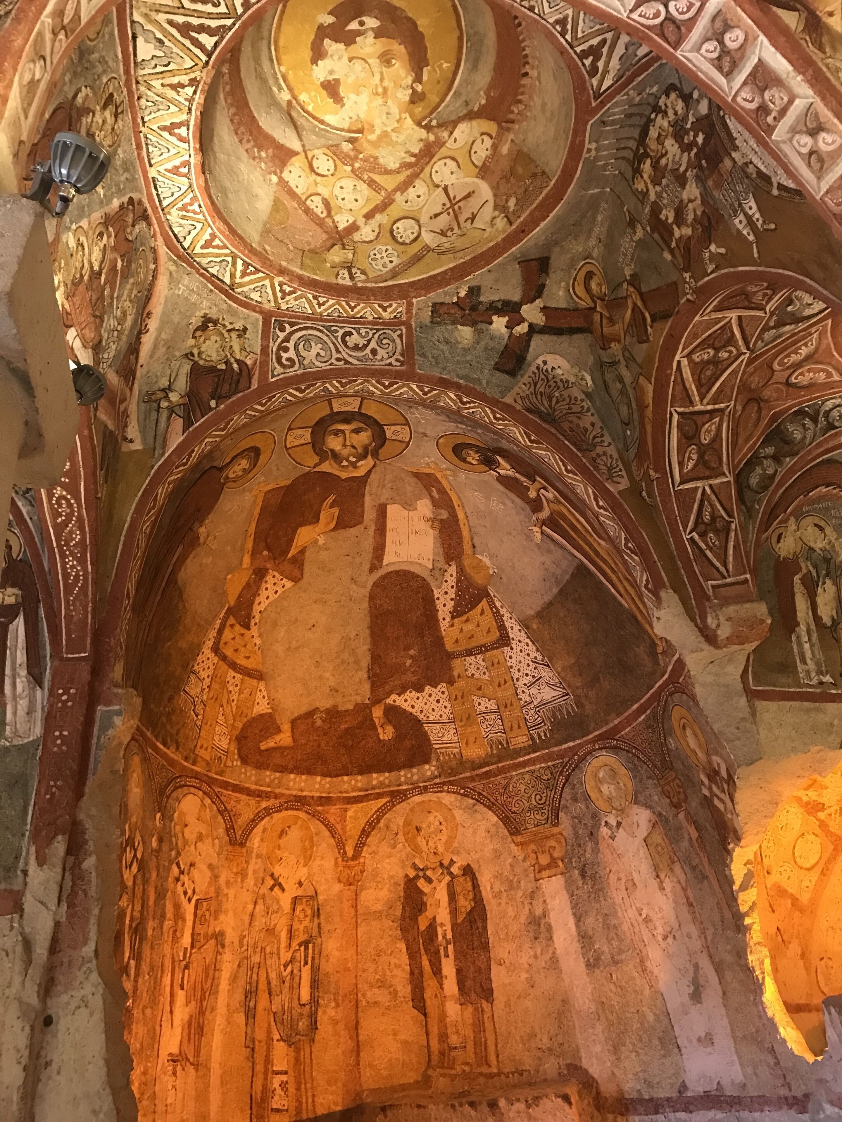 A detailed mosaic with religious figures and architectural elements.