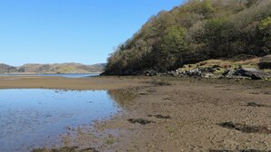 A natural landscape with a beach, water, and hills. - Kilmartin View (Lochgilphead)