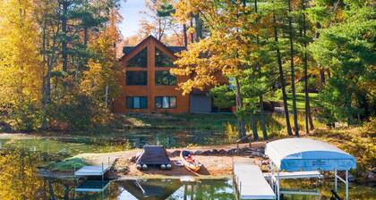 6000 sq ft Whitefish Lake Chain home with year around hot tub & gym!