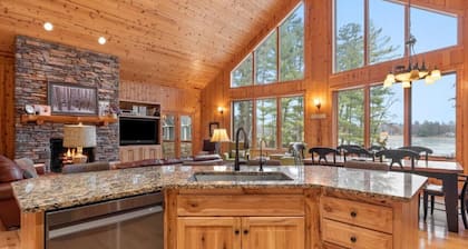 6000 sq ft Whitefish Lake Chain home with year around hot tub & gym!