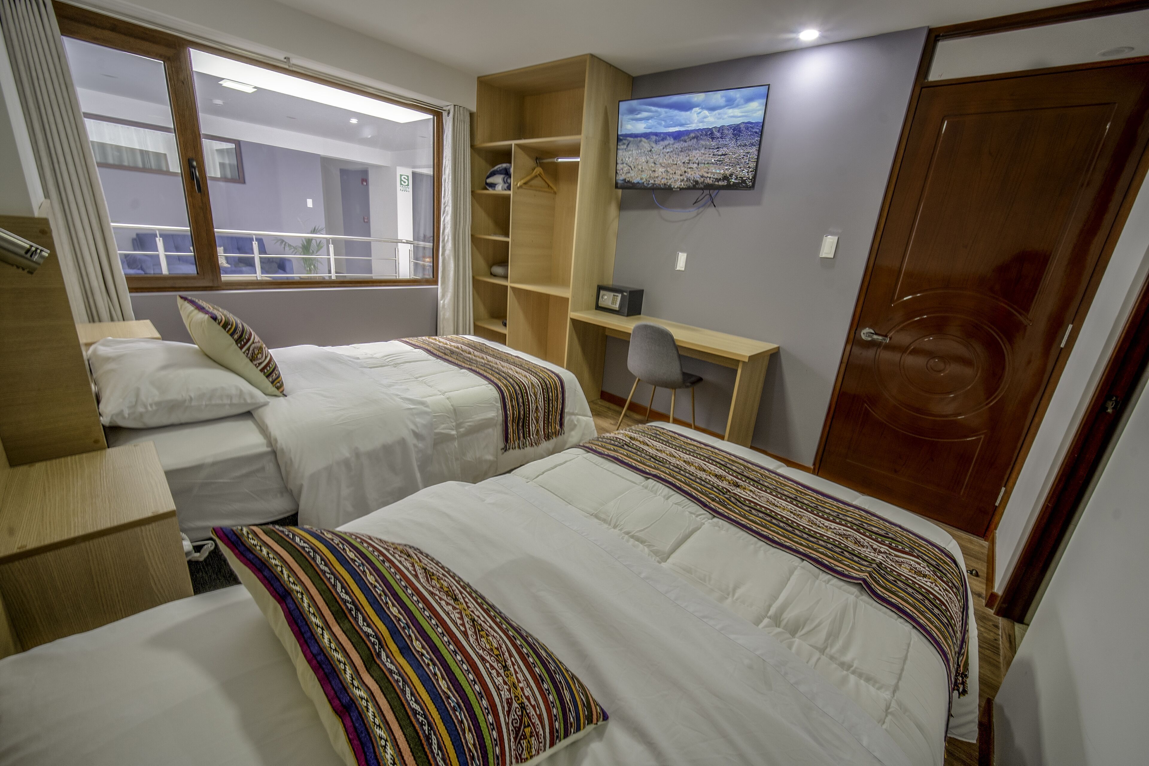 Premium bedding, down duvets, in-room safe, desk