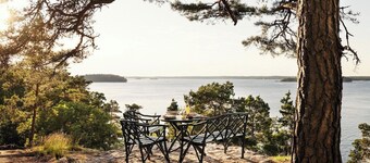 A restored 1911 waterfront estate on Skarpö — 7 bedrooms, private dock, and wood-fired sauna