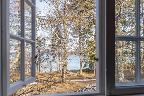 A restored 1911 waterfront estate on Skarpö — 7 bedrooms, private dock, and wood-fired sauna