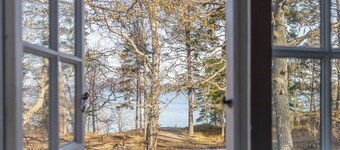 A restored 1911 waterfront estate on Skarpö — 7 bedrooms, private dock, and wood-fired sauna