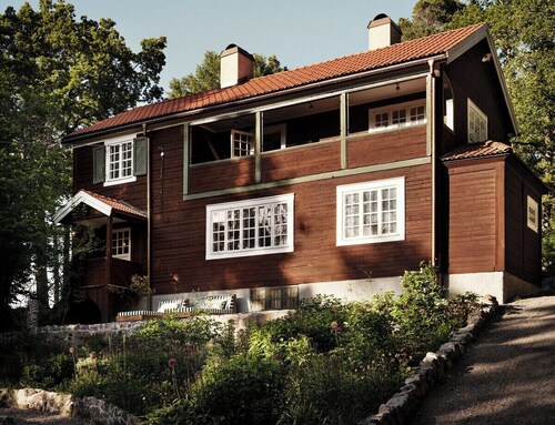 A restored 1911 waterfront estate on Skarpö — 7 bedrooms, private dock, and wood-fired sauna