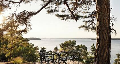 A restored 1911 waterfront estate on Skarpö — 7 bedrooms, private dock, and wood-fired sauna