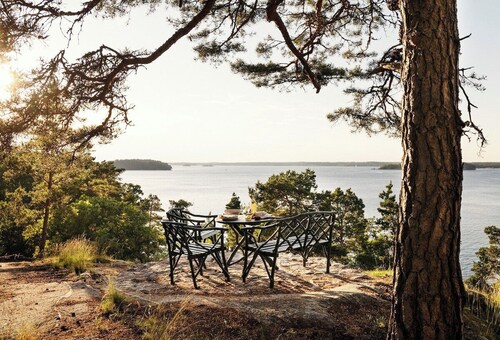 A restored 1911 waterfront estate on Skarpö — 7 bedrooms, private dock, and wood-fired sauna