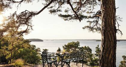 A restored 1911 waterfront estate on Skarpö — 7 bedrooms, private dock, and wood-fired sauna