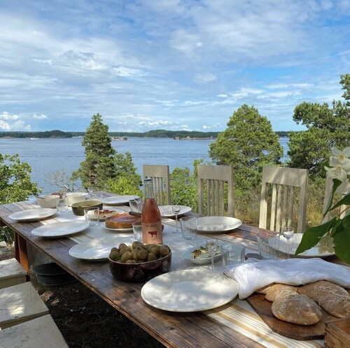 A restored 1911 waterfront estate on Skarpö — 7 bedrooms, private dock, and wood-fired sauna