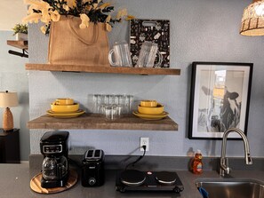 Fridge, microwave, coffee/tea maker, toaster