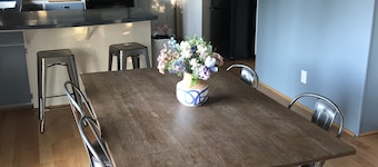 Cozy home next to airport with fenced backyard and lots of sun!