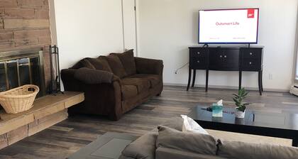 Cozy home next to airport with fenced backyard and lots of sun!