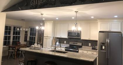 one level brick home with pet friendly fenced back yard , close to Chattanooga