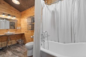Combined shower/tub, hair dryer, towels, soap