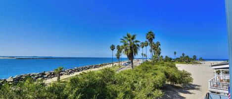 On the beach, sun-loungers, beach towels