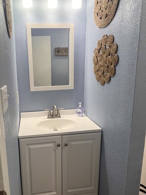Shower, towels, soap, toilet paper