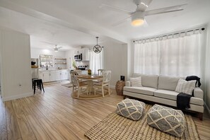 Enjoy meals in the dining area with a round table and comfortable seating.