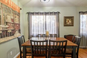 View of dining room from kitchen. Table seats six.