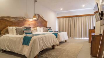 Ropa de cama de alta calidad y minibar