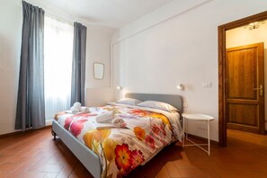2 chambres, fer et planche à repasser