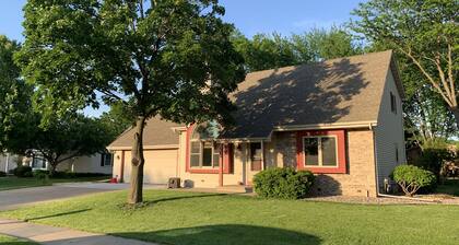 4.8 miles to EAA. 2 story with room for 8. Easy access to Hwy 41