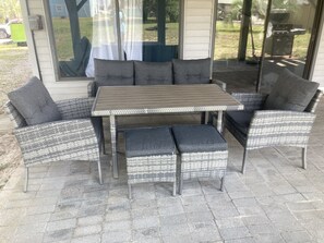 Outdoor dining - Comfy home, 3rd row, step from the beach! (Oak Island)